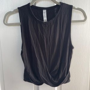 Black Alo Yoga cropped workout top.